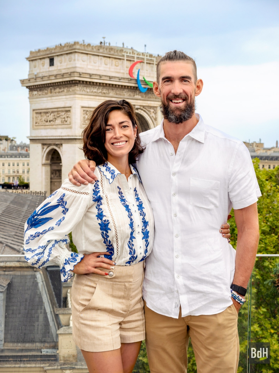 Goldman Sachs reception with guest Michael and Nicole Phelps for Opening ceremony of Olympic Games Paris 2024, in front of Arc de Triomphe with Agitos Paralympics logo